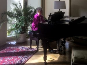 at the piano